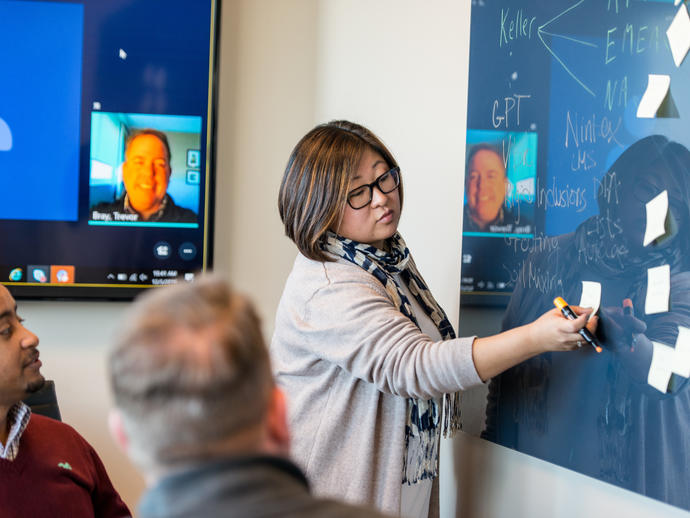 Employees from around the globe at a videoconference